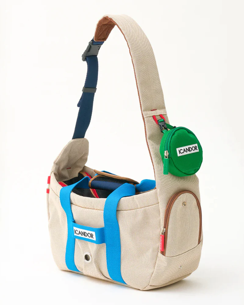 Peek-a-Boo Dog Sling Bag in Cream